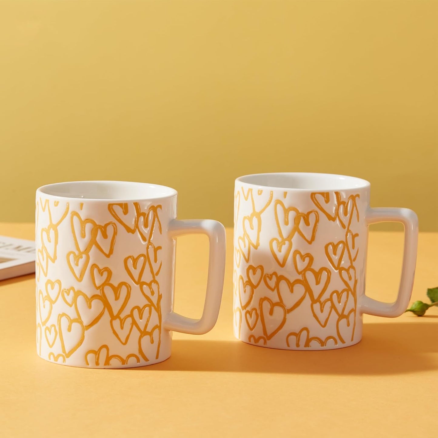 14oz porcelain coffee cup, large yellow ceramic tea cup, heart-shaped pattern mug, dishwasher safe belly mug, cappuccino latte mug, microwave-safe coffee mug, ceramic milk cup, large capacity coffee cup, gift mug for couples, stylish coffee tea cup.