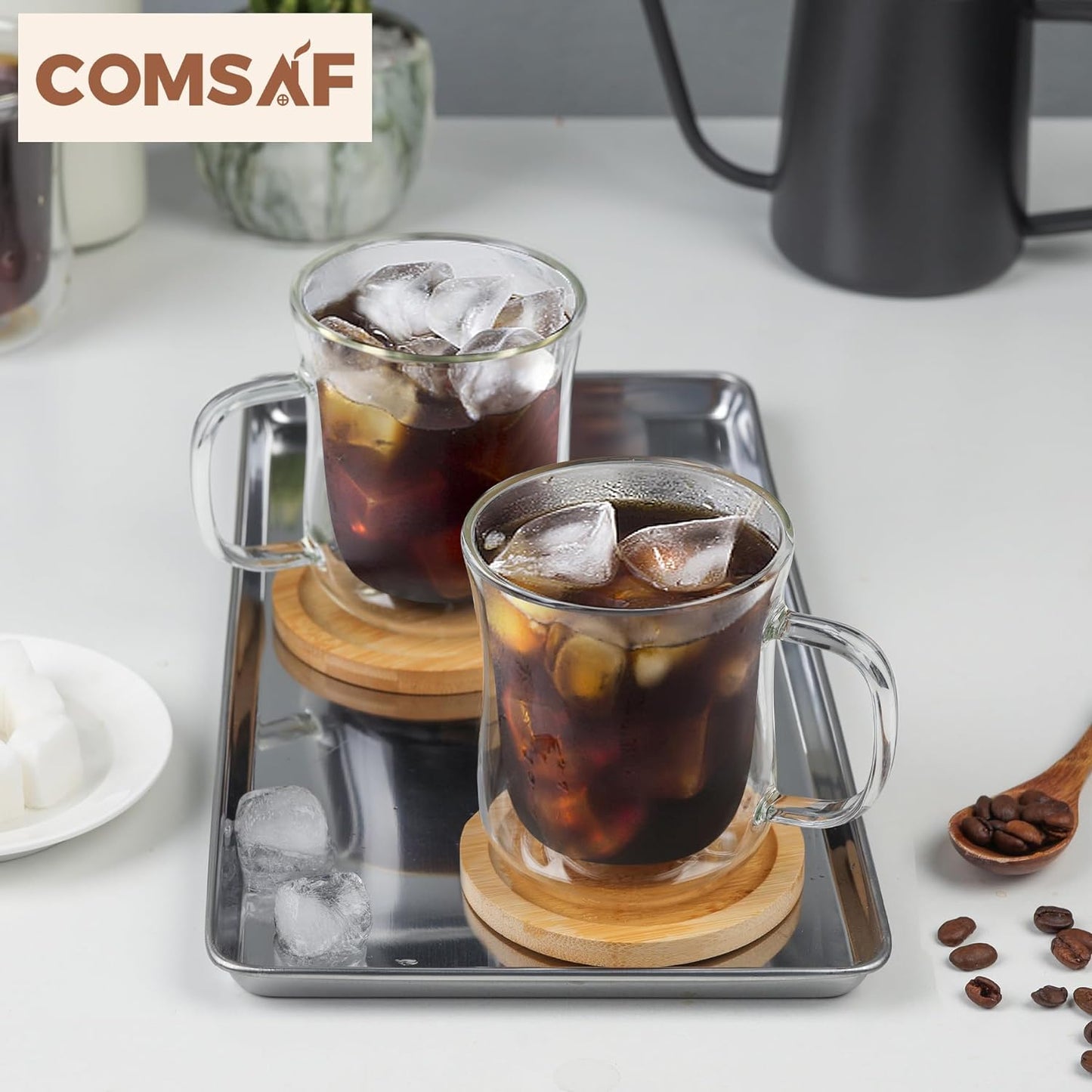 Set of 4 double-walled glass coffee mugs, each holding 8 oz, showcasing the insulated borosilicate glass design with a large handle, perfect for hot or cold beverages.